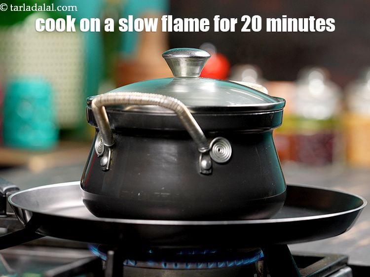 Step 57 – Place the deep non-stick pan or handi on a non-stick tava (griddle) and cook on …