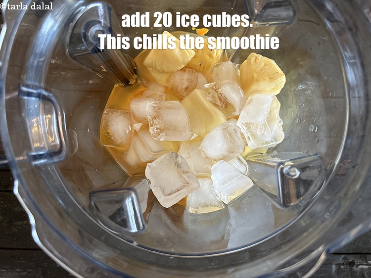 Step 9 – Add 20&nbsp;ice-cubes. This really chills the mango pineapple smoothie.