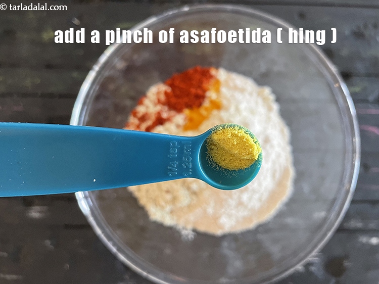 Step 7 – Add&nbsp;<meta charset="UTF-8" />a pinch of&nbsp;<a href="glossary-asafoetida-hing-113i">asafoetida (hing)</a>.