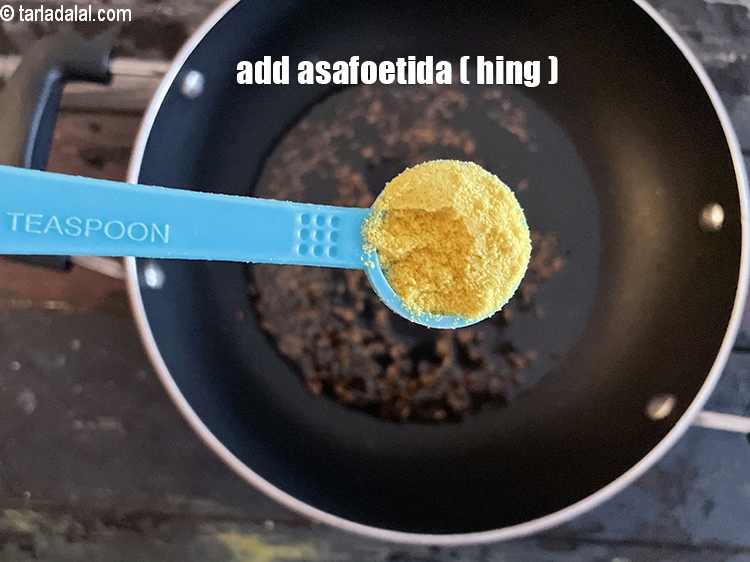 Step 16 – Add&nbsp;<meta charset="UTF-8" />1/2 tsp&nbsp;<a href="glossary-asafoetida-hing-113i">asafoetida (hing)</a>.
