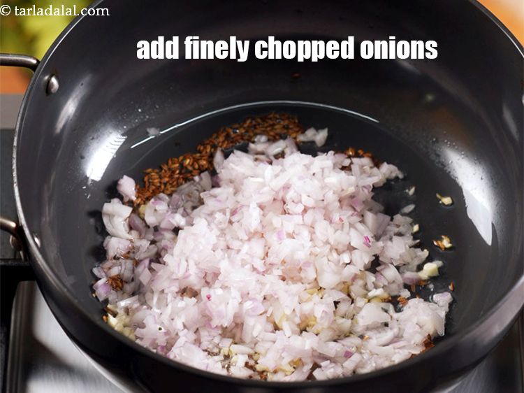 Step 7 – Add &frac12; cup of finely&nbsp;<a href="https://www.tarladalal.com/glossary-chopped-onions-722i">chopped onions</a>.