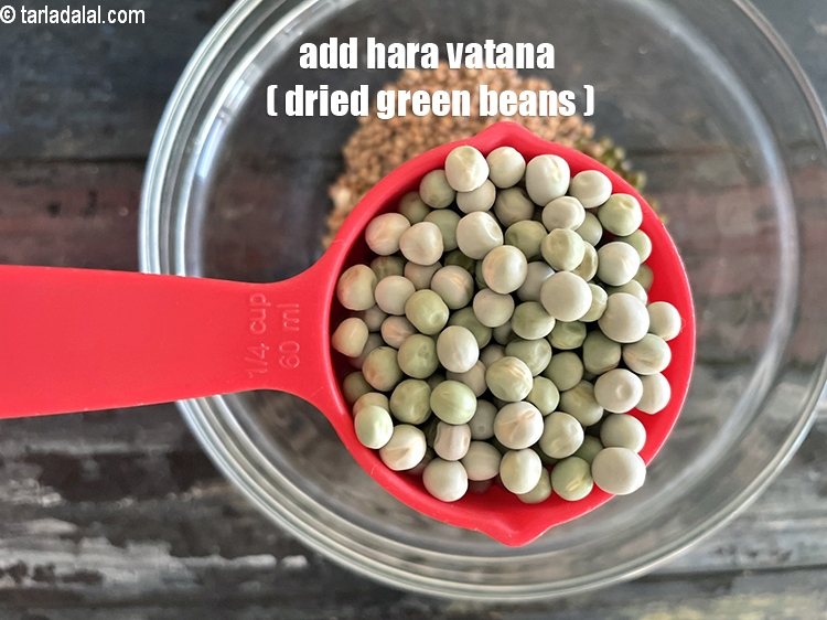 Step 7 – Add&nbsp;<meta charset="UTF-8" />1/4 cup&nbsp;<a href="glossary-hara-vatana-dried-green-peas-sukhe-hare-matar-179i">hara vatana (dried green peas)</a>.