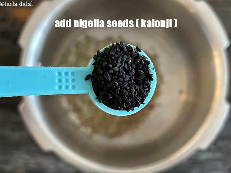 Step 7 – Add&nbsp;<meta charset="UTF-8" />1/2 tsp&nbsp;<a href="glossary-nigella-seeds-kalonji-onion-seeds-552i">nigella seeds (kalonji)</a>.