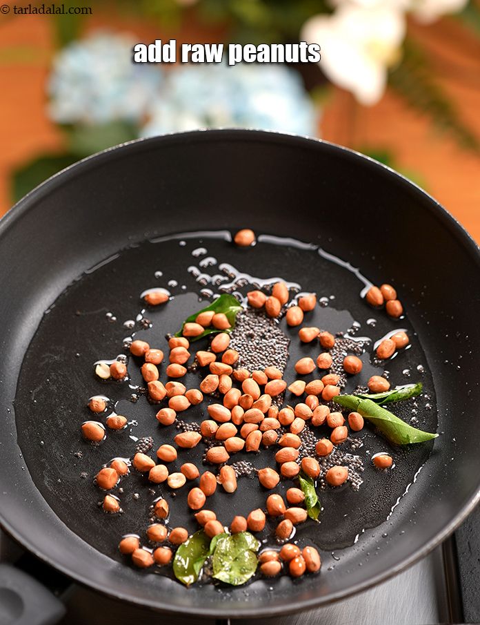 Step 5 – Once the seeds crackle and leaves turn a little crisp, add 1/4 cup&nbsp;<a href="https://www.tarladalal.com/glossary-raw-peanuts-kachi-mungfali-kachi-moongfali-847i">raw peanuts</a>.&nbsp;