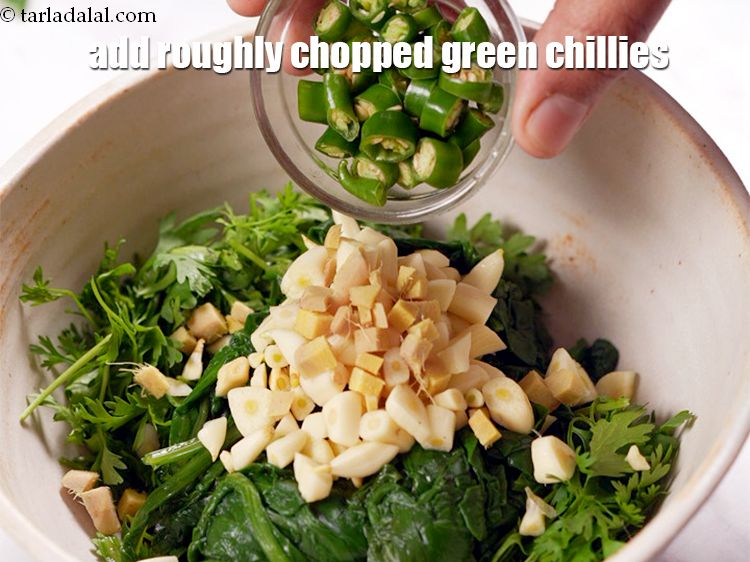 Step 7 – Add 1 tbsp roughly <a href="https://www.tarladalal.com/glossary-chopped-green-chilli-820i">chopped green chillies</a>.&nbsp;