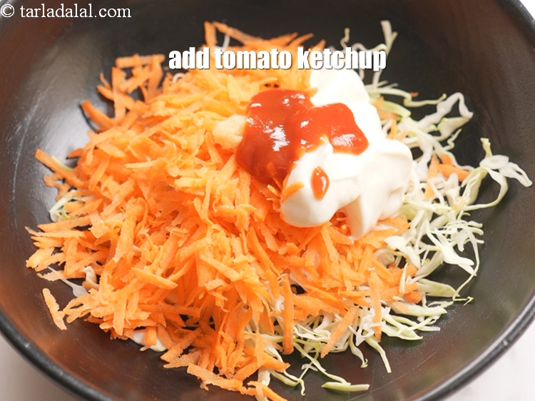 Step 7 – Add 2 tsp&nbsp;<a href="https://tarladalal.com/glossary-tomato-ketchup-tomato-sauce-181i">tomato ketchup</a>.&nbsp;