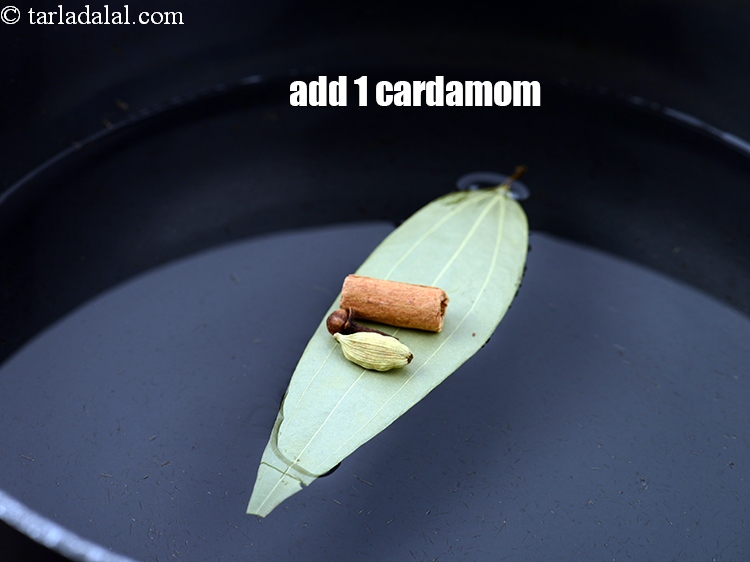 Step 9 – Add 1&nbsp;<a href="https://www.tarladalal.com/glossary-cardamom-elaichi-262i">cardamom (elaichi)</a>.