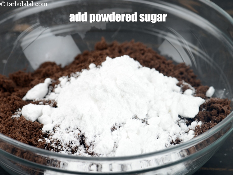 Step 7 – Add 2 tbsp <a href="https://www.tarladalal.com/glossary-powdered-sugar-280i">powdered sugar</a>.