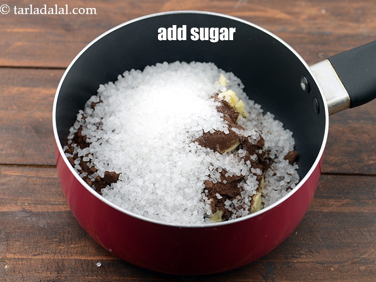 Step 7 – Add 1/2 cup&nbsp;<a href="https://www.tarladalal.com/glossary-sugar-chini-shakkar-278i">sugar</a>.