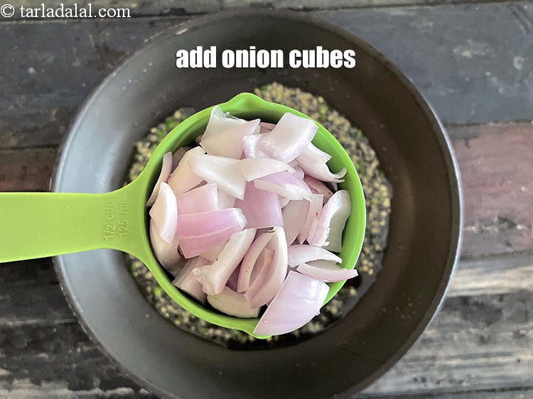Step 14 – Add&nbsp;<meta charset="UTF-8" />1/2 cup&nbsp;<a href="glossary-onion-cubes-732i">onion cubes</a>.