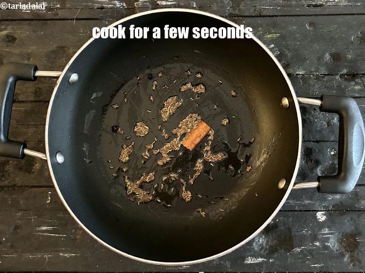 Step 13 – Cook for a few seconds and let the seeds crackle.