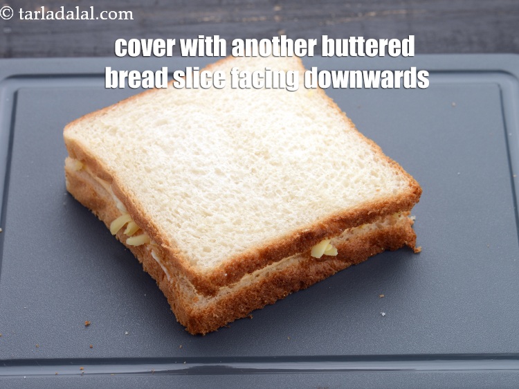 Step 7 – Cover with another buttered bread slice facing downwards.