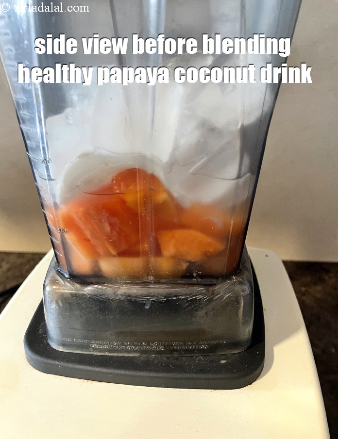Step 12 – Side view before blending the <meta charset="UTF-8" /><strong>healthy&nbsp;papaya coconut&nbsp;drink</strong>.