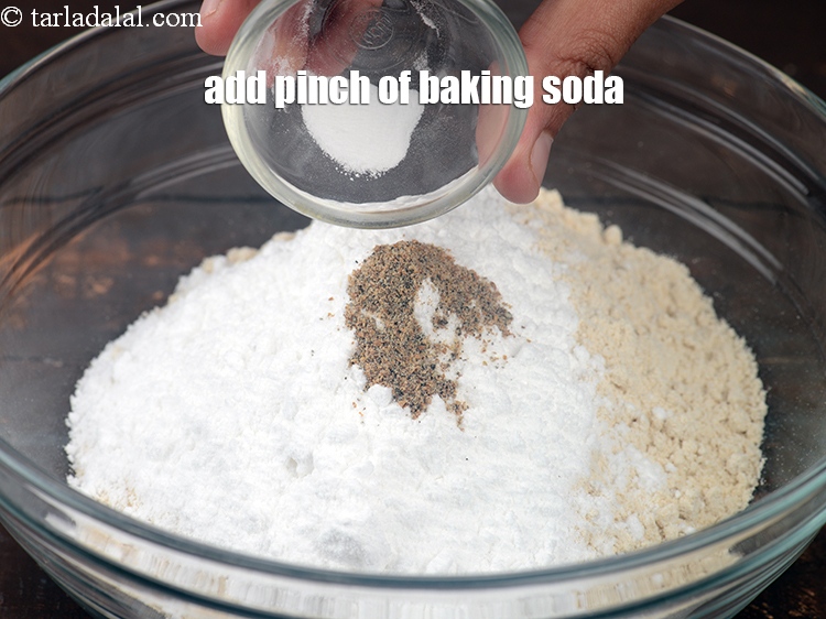 Step 7 – Add a pinch of <a href="https://www.tarladalal.com/glossary-baking-soda-soda-bi-carb-615i">baking soda</a>.