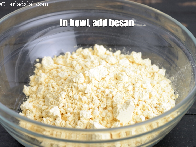 Step 8 – In a deep bowl, add 1&frac34; cup <a href="https://www.tarladalal.com/glossary-besan-chana-dal-flour-bengal-gram-flour-952i">besan (bengal gram flour)</a>.&nbsp;