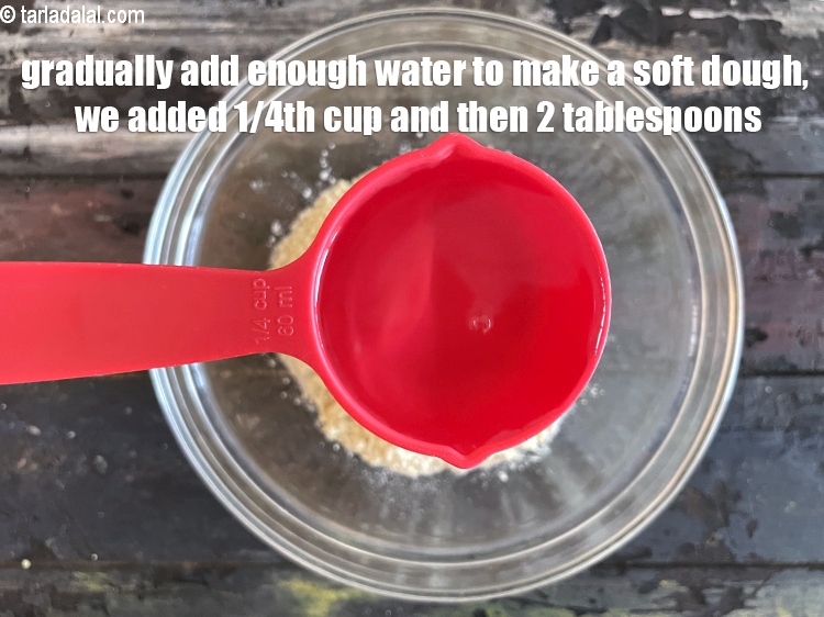 Step 8 – Gradually add enough water to make a soft dough. We added 1/4 cup water plus …