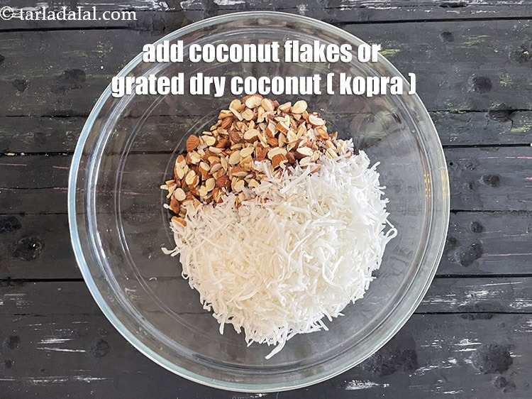 Step 15 – Add 1 cup coconut flakes or&nbsp;1 cup&nbsp;<a href="https://tarladalal.com/glossary-grated-dry-coconut-2272i">grated dry coconut (kopra)</a>.