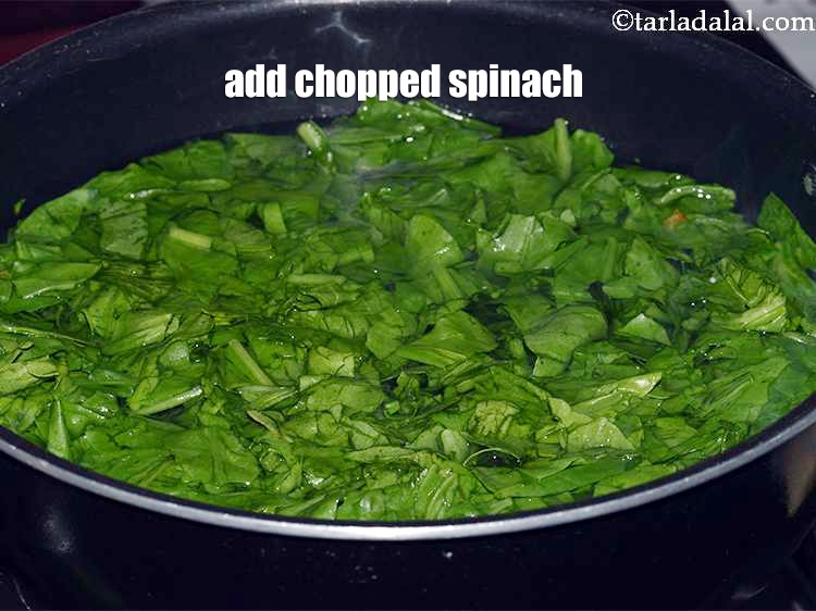 Step 7 – Add 4 cups&nbsp;<a href="https://tarladalal.com/glossary-chopped-spinach-780i">chopped spinach (palak)</a>.&nbsp;