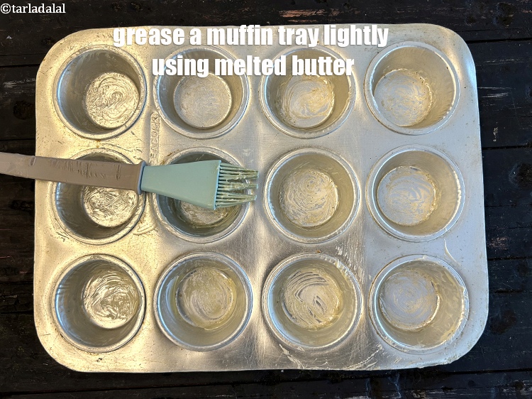 Step 8 – Grease a muffin tray&nbsp;lightly using melted&nbsp;butter.