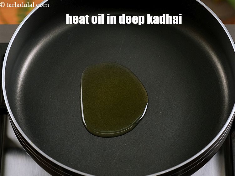 Step 7 – Heat 2 tsp oil in a deep non-stick kadhai.