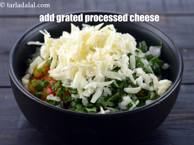 Step 7 – Add 1/4 cup <a href="https://www.tarladalal.com/glossary-grated-processed-cheese-868i">grated processed cheese</a>.
