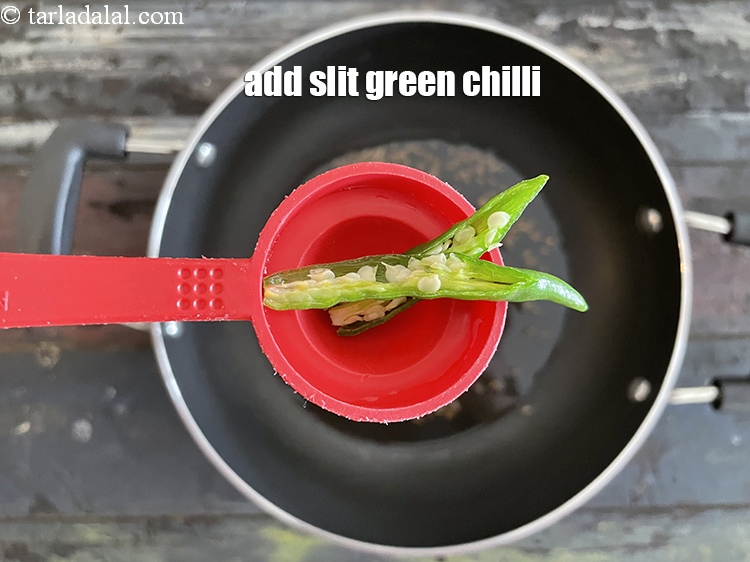 Step 8 – Add&nbsp;<meta charset="UTF-8" />1&nbsp;<a href="glossary-slit-green-chillies-1856i">slit green chilli</a>.
