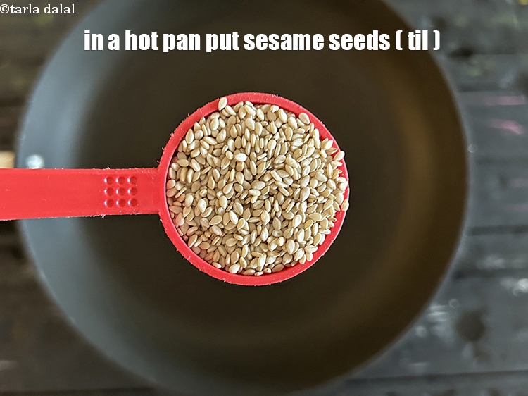 Step 7 – In a hot pan put&nbsp;<meta charset="UTF-8" />1 tbsp&nbsp;<a href="glossary-sesame-seeds-til-gingelly-seeds-612i">sesame seeds (til)</a>.