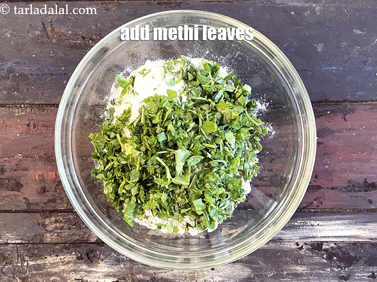 Step 7 – Add&nbsp;<meta charset="UTF-8" />1/2 cup&nbsp;finely&nbsp;<a href="glossary-chopped-fenugreek-811i">chopped fenugreek (methi)</a>&nbsp;leaves.
