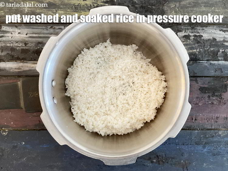 Step 9 – In a pressure cooker put&nbsp;<meta charset="UTF-8" />1 cup&nbsp;<a href="glossary-rice-chawal-533i">rice (chawal)</a>&nbsp;, soaked for 15 minutes and …