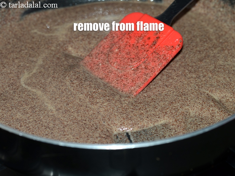 Step 8 – <html><head></head><body><p>To make <strong>nachni ladoo recipe |&nbsp;ragi ladoo&nbsp;|&nbsp;healthy recipe for pregnancy&nbsp;|&nbsp;ragi laddu&nbsp;|&nbsp;</strong>remove the cooked ragi&nbsp;from the …