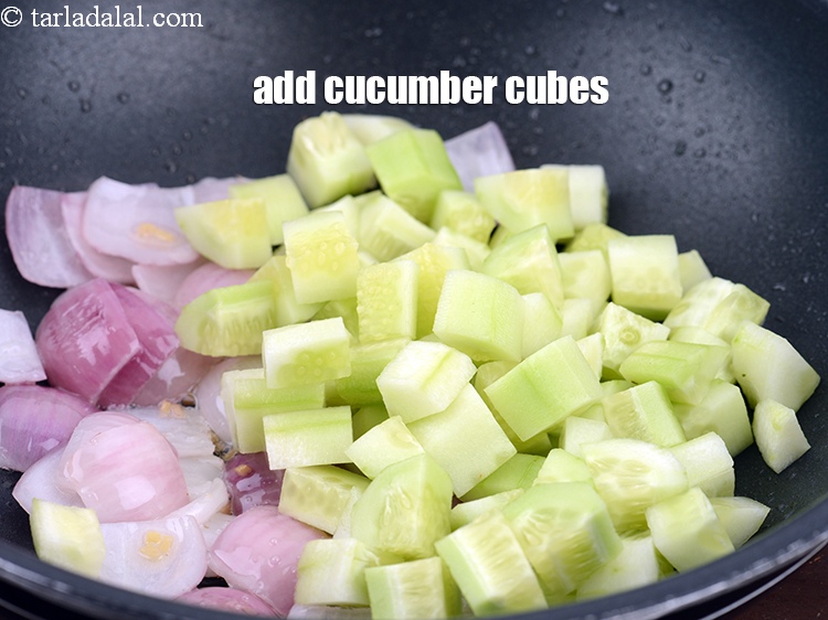 Step 7 – Add 1 cup <a href="https://www.tarladalal.com/glossary-cucumber-cubes-726i">cucumber cubes</a>.