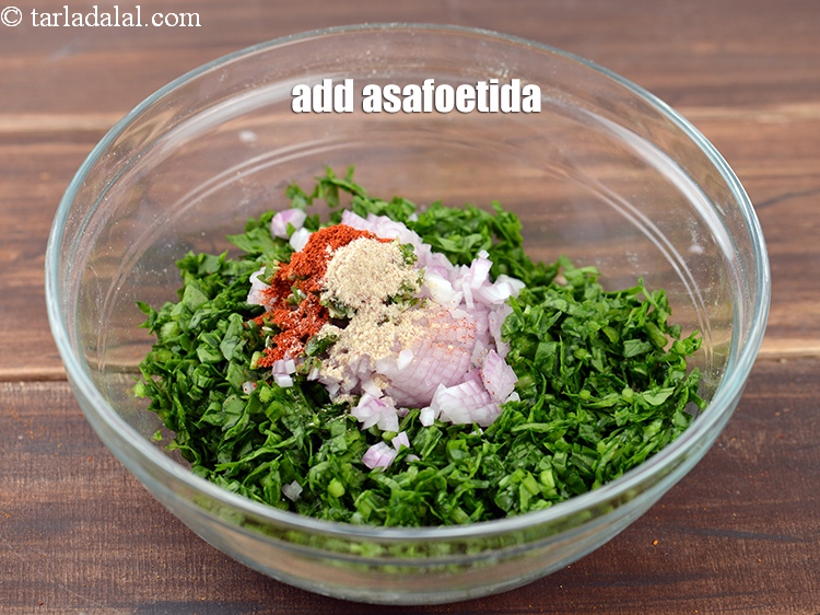 Step 7 – Add 1/4 tsp <a href="https://www.tarladalal.com/glossary-asafoetida-hing-113i">asafoetida (hing)</a>.