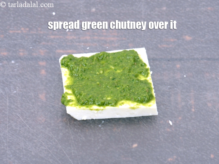 Step 18 – Spread &frac12; tsp of <a href="https://www.tarladalal.com/green-chutney-22266r">green chutney</a>&nbsp;over it.&nbsp;