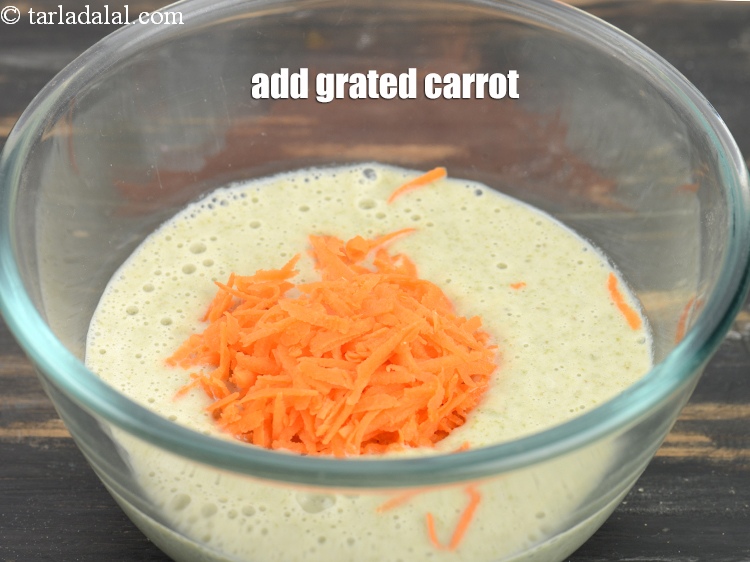 Step 7 – Add 2 tbsp&nbsp;<a href="https://www.tarladalal.com/glossary-grated-carrot-816i">grated carrot</a>.