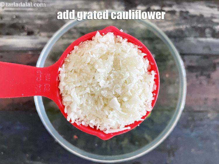 Step 9 – Add&nbsp;<meta charset="UTF-8" />1/4 cup&nbsp;<a href="glossary-grated-cauliflower-994i">grated cauliflower</a>.