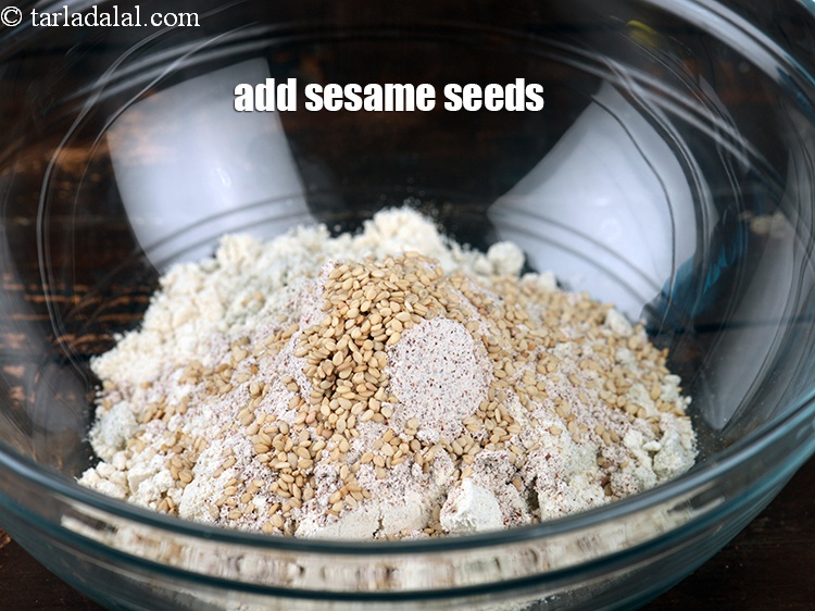 Step 7 – Add 1 tbsp&nbsp;<a href="https://www.tarladalal.com/glossary-sesame-seeds-til-gingelly-seeds-612i">sesame seeds (til)</a>.&nbsp;