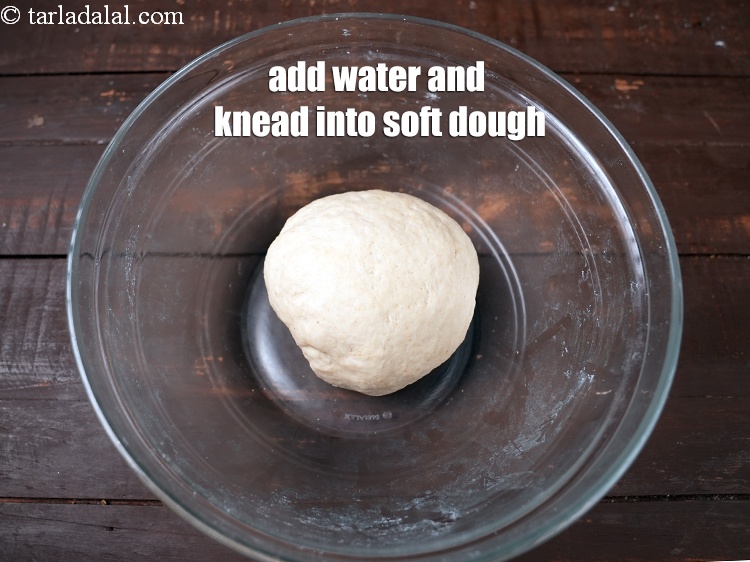 Step 7 – Add &frac14; cup water and knead into a soft dough.