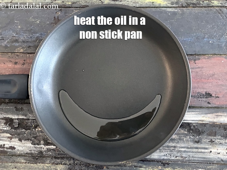 Step 9 – Heat 1 tsp oil in a broad non-stick pan.