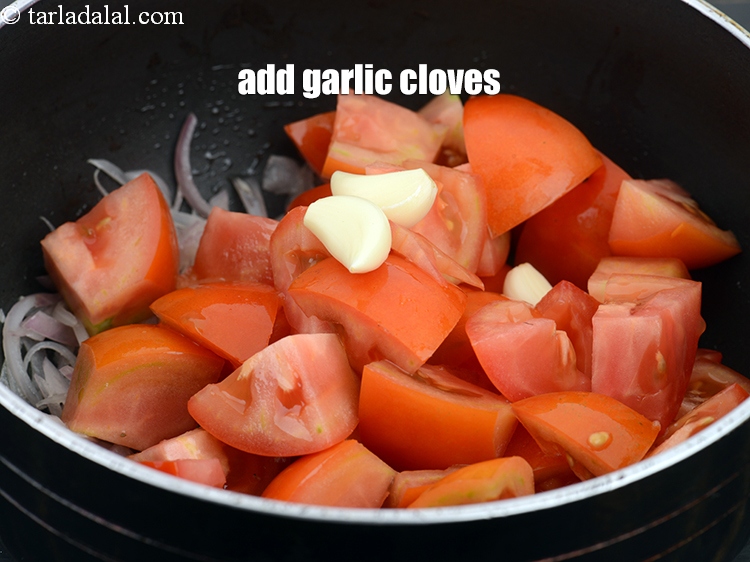 Step 9 – Add 3 <a href="https://www.tarladalal.com/glossary-garlic-cloves-1857i">garlic (lehsun) cloves</a>.