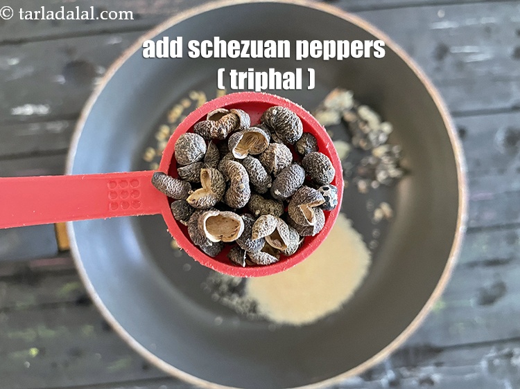 Step 7 – Add&nbsp;<meta charset="UTF-8" />1 tsp&nbsp;<a href="glossary-schezuan-peppers-schezwan-pepper-sichuan-pepper-1465i">schezuan peppers (triphal)</a>.