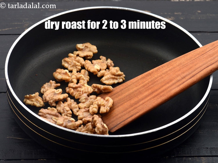 स्टेप 7 – बीच-बीच में हिलाते हुए मध्यम आंच पर अखरोट को 2 …