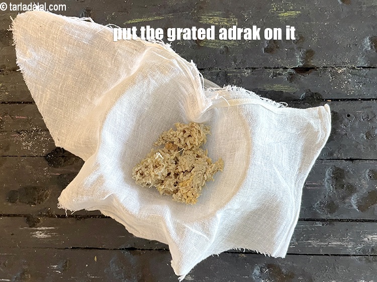Step 9 – Put the grated adrak on it.