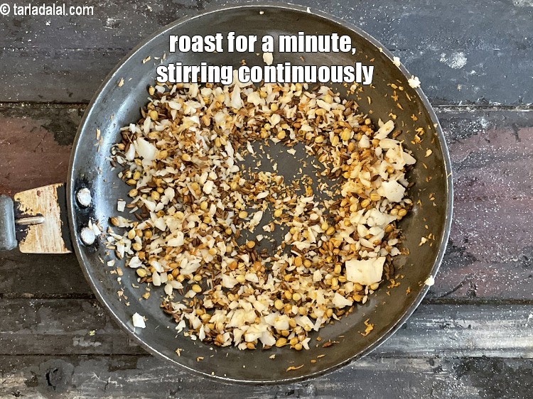 Step 13 – Roast for a minute, while stirring continuously.&nbsp;Keep aside to cool.