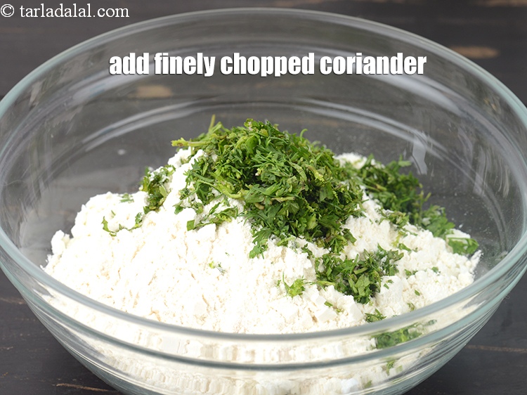 Step 7 – Add 2 tbsp finely <a href="https://www.tarladalal.com/glossary-chopped-coriander-783i">chopped coriander (dhania)</a>.