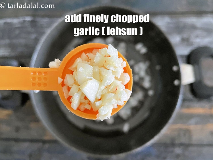 Step 10 – Add&nbsp;<meta charset="UTF-8" />2 tsp&nbsp;finely&nbsp;<a href="glossary-chopped-garlic-790i">chopped garlic (lehsun)</a>.
