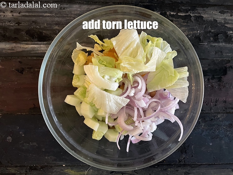 Step 16 – Add&nbsp;<meta charset="UTF-8" />1/2 cup&nbsp;<a href="glossary-lettuce-salad-ke-patte-498i">lettuce</a>&nbsp;, torn.