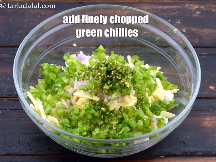 Step 7 – Add 2 tsp&nbsp;finely&nbsp;<a href="https://www.tarladalal.com/glossary-chopped-green-chilli-820i">chopped green chillies</a>.