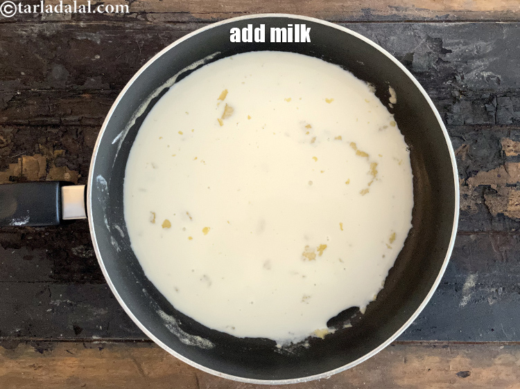 Step 20 – Add&nbsp;<meta charset="UTF-8" />1 cup&nbsp;<a href="glossary-milk-doodh-full-fat-milk-buffalo-milk-full-cream-milk-514i">milk</a>.