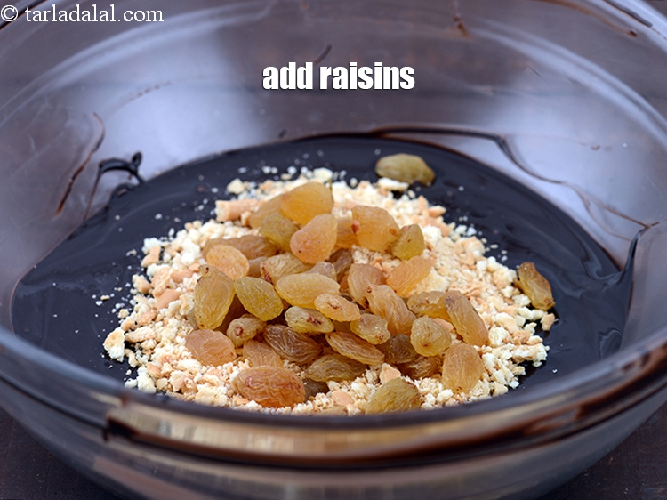 Step 7 – Add 2 tbsp <a href="https://www.tarladalal.com/glossary-raisins-kishmish-kismis-597i">raisins (kismis)</a>.