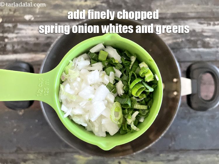Step 10 – Add&nbsp;1/2 cup&nbsp;finely&nbsp;chopped spring onions whites&nbsp;and greens.